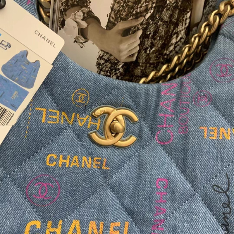 Ch*el  maxi hobo bag printed denim & gold-tone metal blue & multicolor