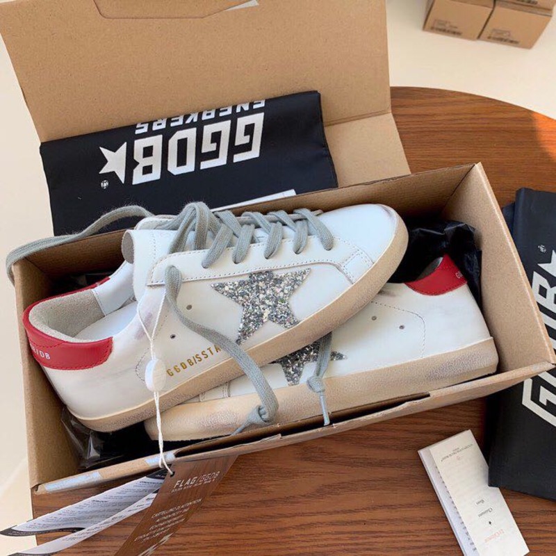 golden goose S*per-star sneakers with sliver glitter and red heel tab