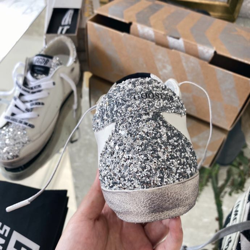 golden goose S*per-star sneakers with sliver star and sliver heel tab