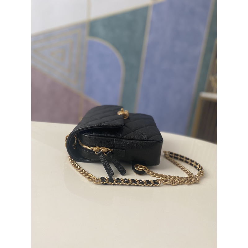 Ch*el grained calfskin & gold-tone metal backpack black