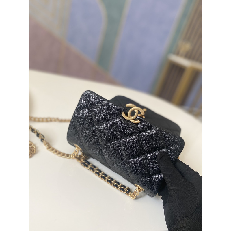 Ch*el grained calfskin & gold-tone metal backpack black