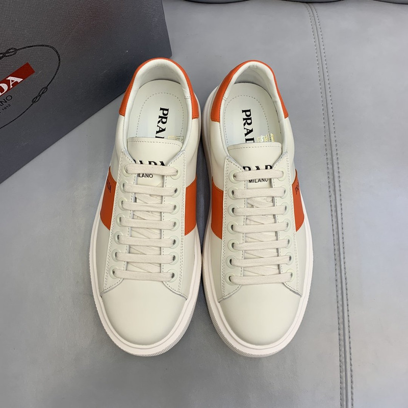 Pra*a unisex plain leather logo low-top sneakers orange