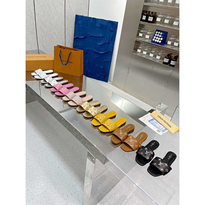 l**is V*t*n revival flat mule slides