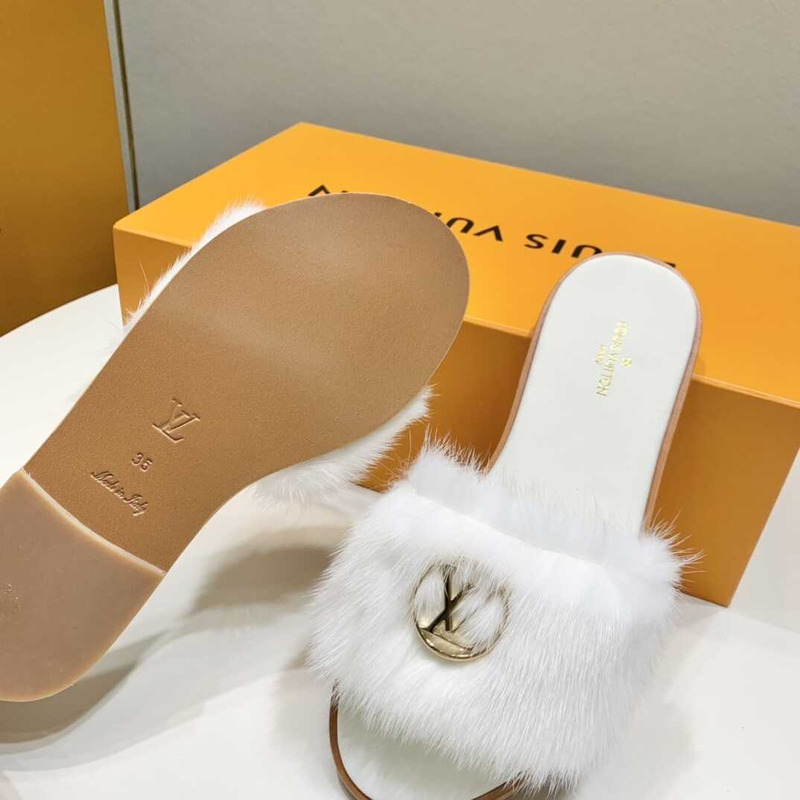 l**is V*t*n white furry slippers
