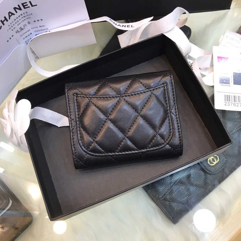 Ch*el lambskin small flap wallet black
