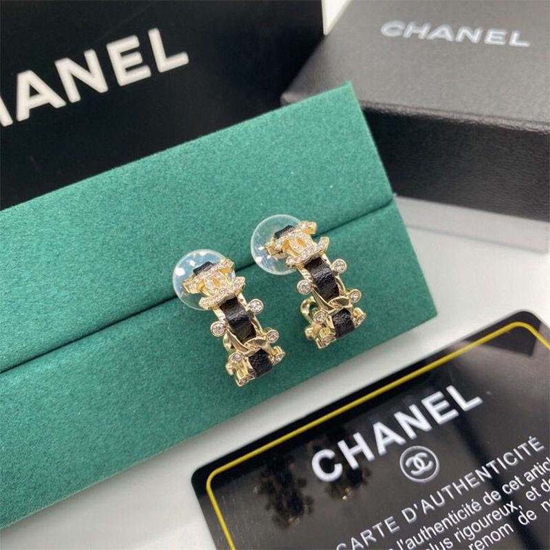 Ch*el metal and calfskin crystal earrings