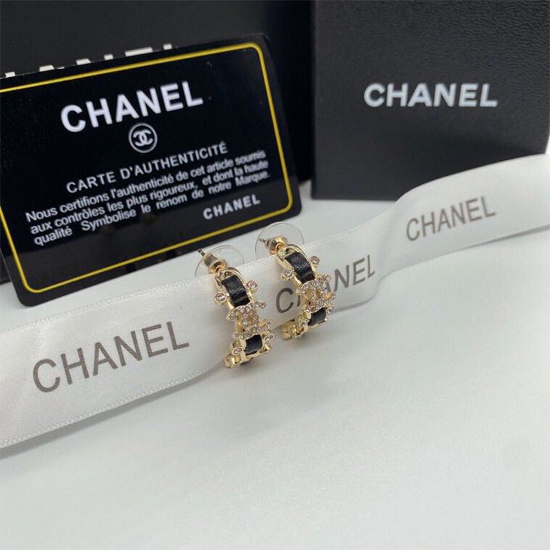 Ch*el metal and calfskin crystal earrings