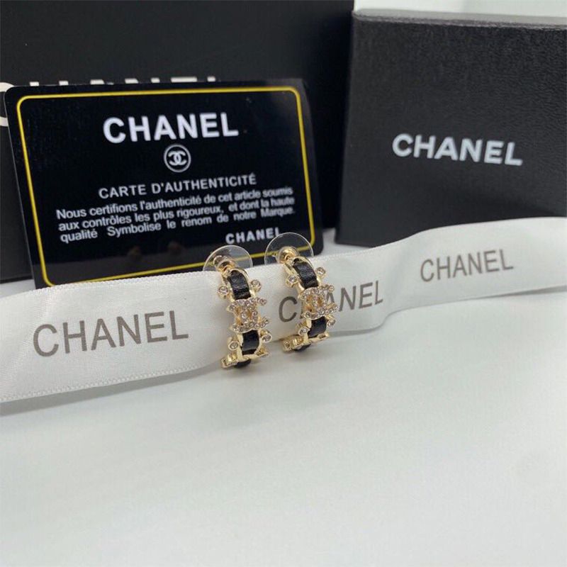 Ch*el metal and calfskin crystal earrings